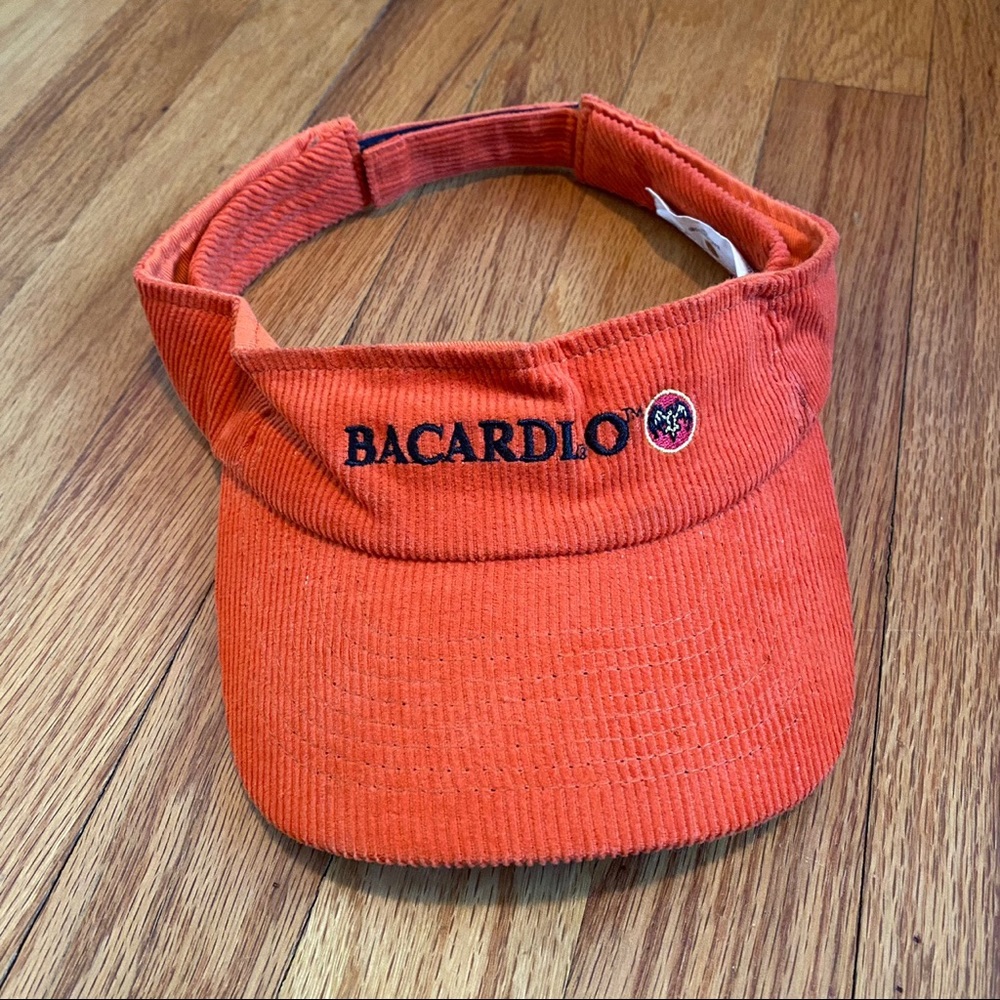 2005 Bacardi O Corduroy Visor Hat
One size Adjustable Velcro Strap
Color Orange